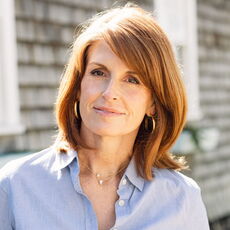 A person poses for a headshot.