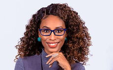 A person poses for a headshot.
