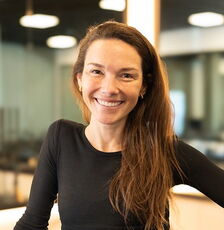 A person poses for a headshot.