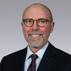 headshot of man in suit