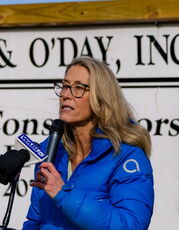 A person is outside talking