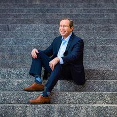 David Whitaker sitting on steps.