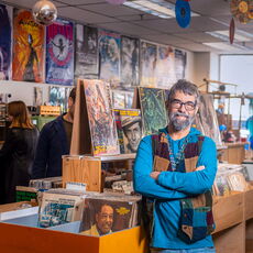 Mike Breton inside Electric Buddhas record store