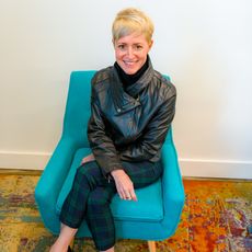 Torey Penrod-Cambra seated on a chair