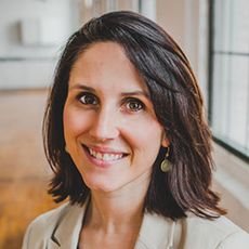 head shot of woman with dark hair