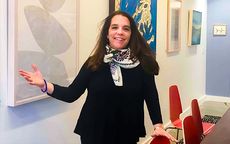 Dinah Minot in the Creative Portland HQ showing artwork on the walls