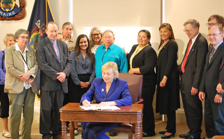 Gov. Janet Mills signing bill