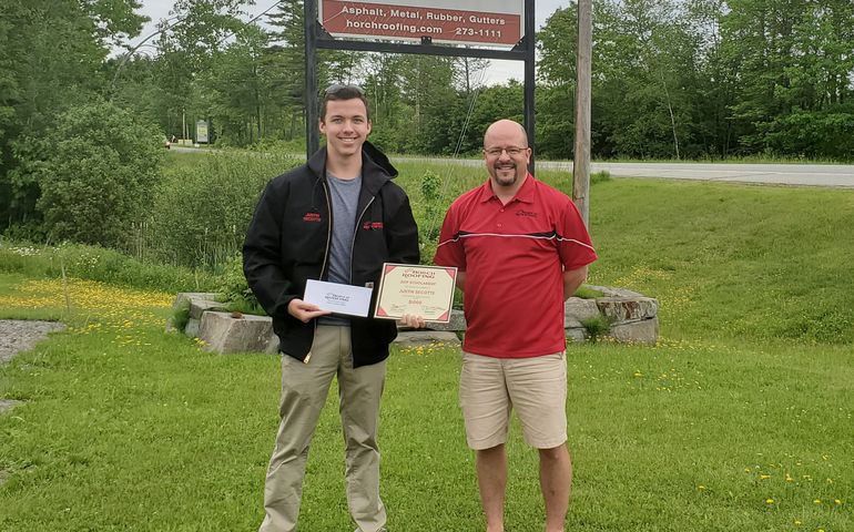 Horch Roofing scholarship winner with Peter Horch, the company's owner.