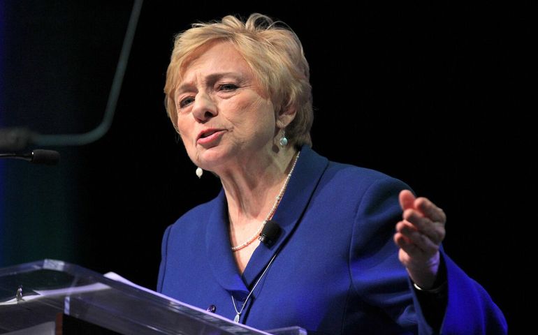 Portrait of Maine Gov. Janet Mills giving a speech .