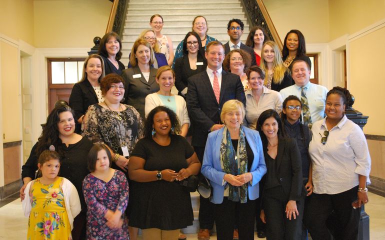 Gov. Mills with signing group