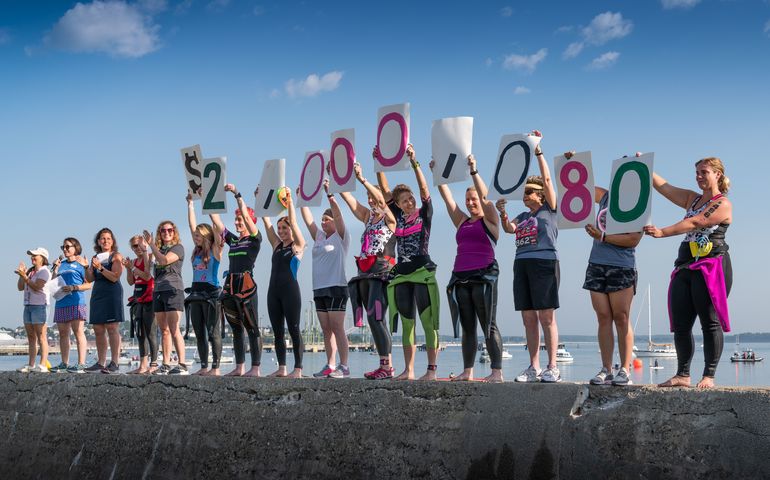 Start of Tri for a Cure fundraiser in South Portland showing amount raised