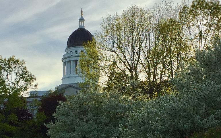 Augusta state house behind trees