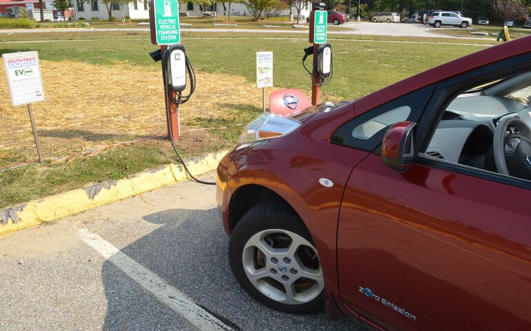 Electric car at charging station