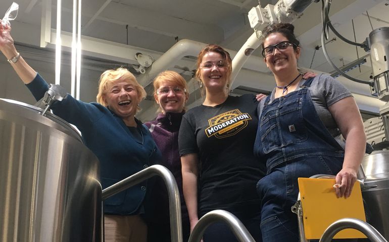 Maine Gov. Janet Mills with brewers at Rising Tide Brewing Co. in Portland 