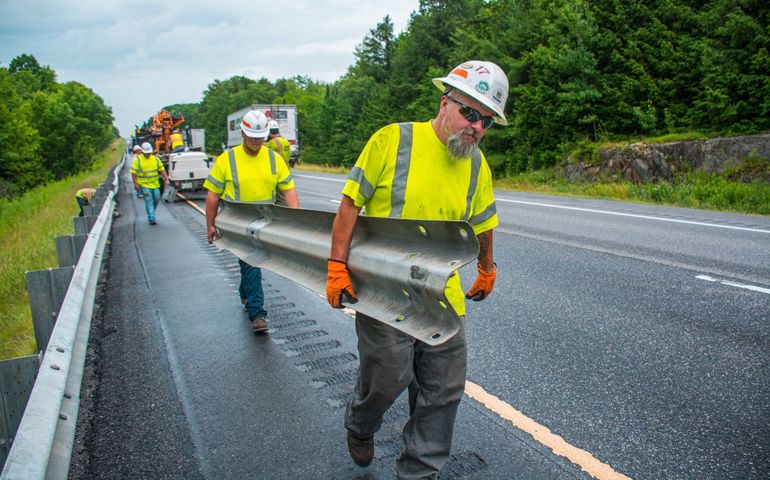 guardrail construction workers