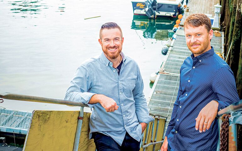 Patrick Arnold and Chris Cary on Portland's waterfront.