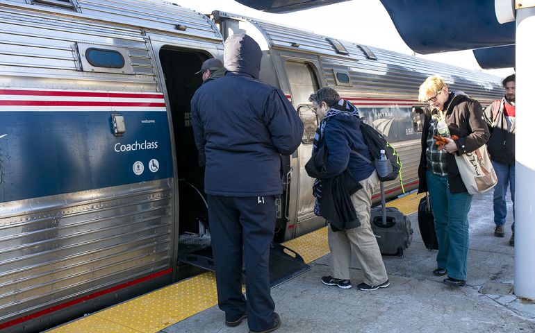 Passengers boarding an Amtrak train