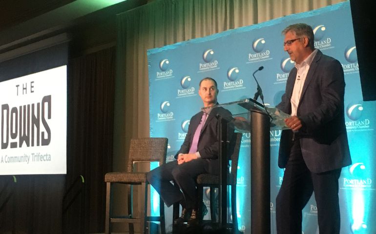 Developers Josh Levy and Roccy Risbara on stage at Portland Chamber event.