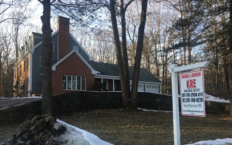 Photo of house with realtor sign in Cape Elizabeth.