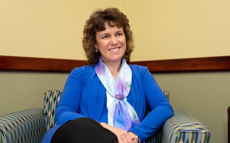 Laurie Lachance seated in her office