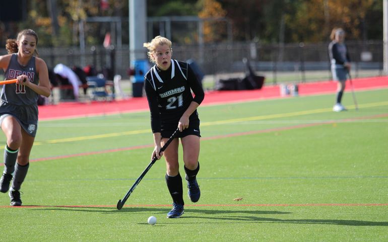 Thomas College field hockey game action shot. 