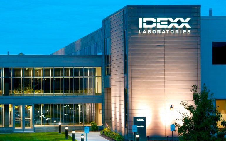 Illuminated IDEXX building, seen from the outside.
