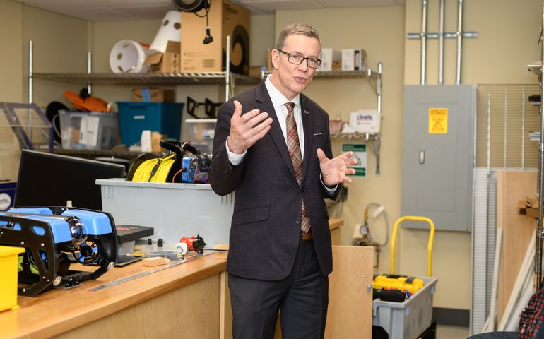 UNE President James Herbert in the Makerspace lab at the school's Biddeford campus