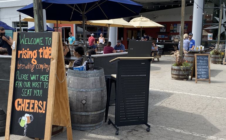 Photo of customers on the patio at Rising Tide Brewing Co. in Portland 