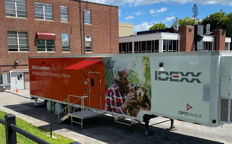 trailer outfitted with as mobile lab, showing IDEXX logo on its side