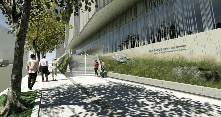 A rendering of a shade-speckled walk in front of a modern building, with boulders and native plants in between and a sign that says Sally Shaw Causeway gifted by Shaw Brothers Construction