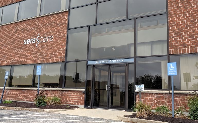entrance to two-story brick office building
