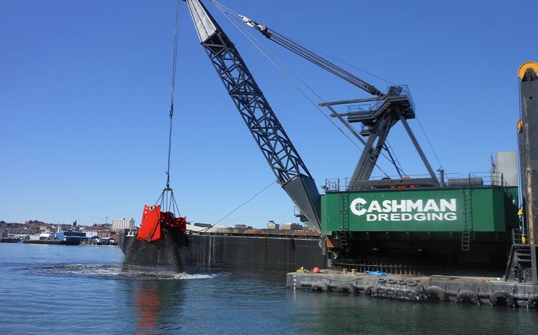 marine dredging crane on barge in portland harbor
