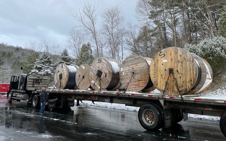 Tilson workers and truck with cables for broadband