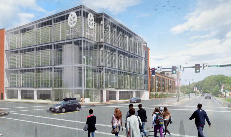 A rendering of a glass-fronted six story building ona busy street corner with a diverse group of people crossing the street toward it and a sign on it that says vertical harvest