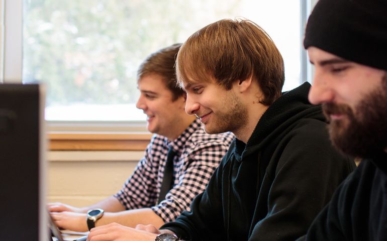 college kids at computers 