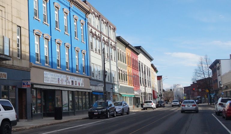 A city street with colorful buildings