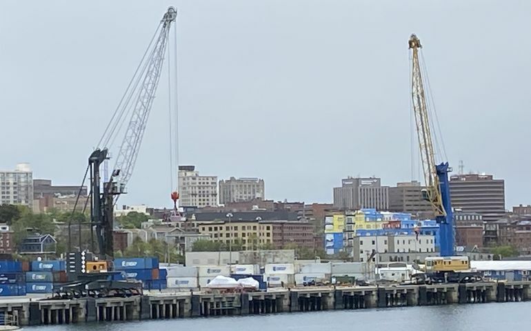 exterior photo of Portland International Marine Terminal showing cranes and containers