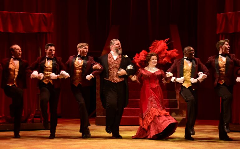 Actors on stage in "Hello, Dolly!"