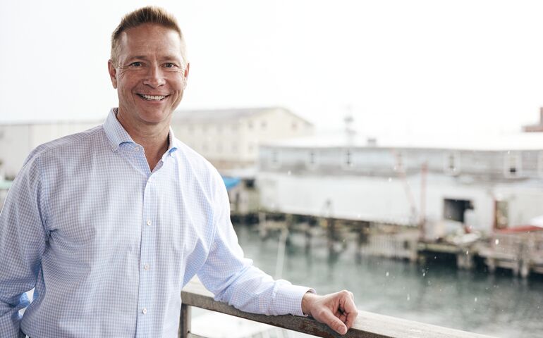 person posing over harbor