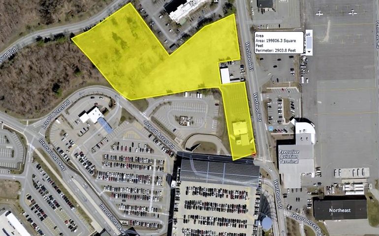 aerial photo of Portland International Jetport, with land highlighted in yellow