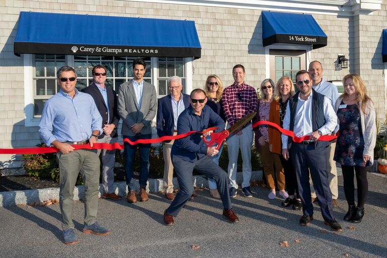 people cutting ribbon