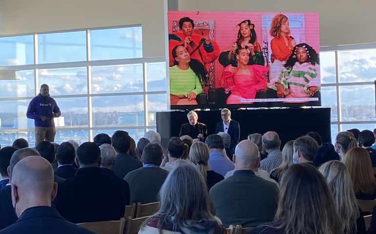 Roux Institute event at Ocean Gateway - person speaking in front of audience 