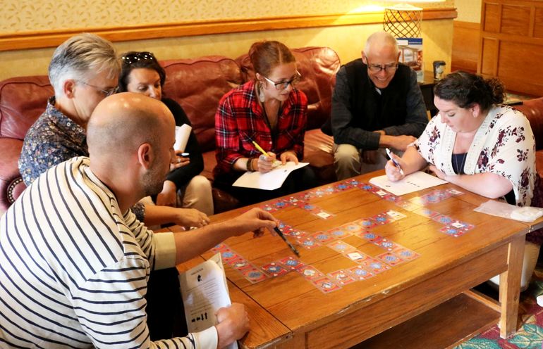 6 people at coffee table