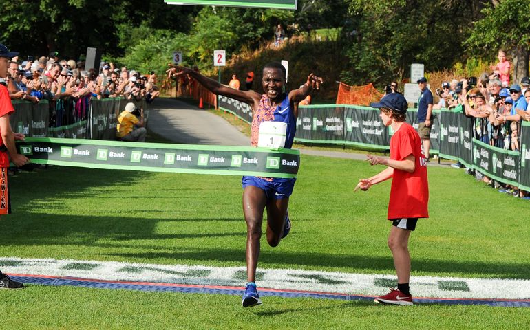 runner crossing the finish line 