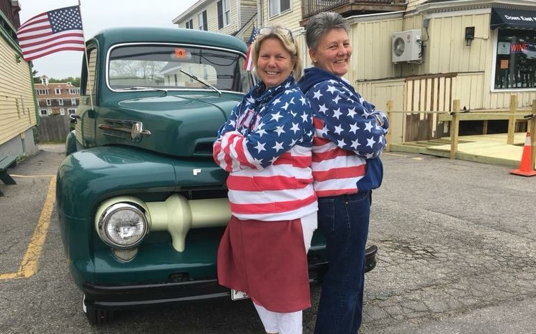 2 people truck flags