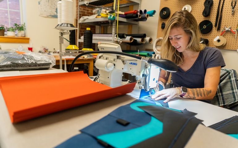 Person at sewing machine 