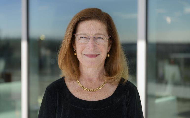 Leslie Hyman in front of the Roux Institute 