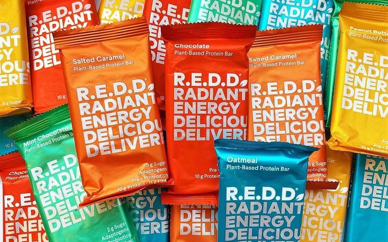 close-up of over a dozen REDD protein bars