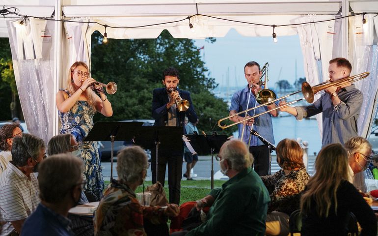 4 people playing instruments