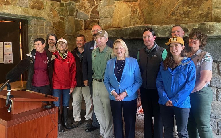 people and stone fireplace